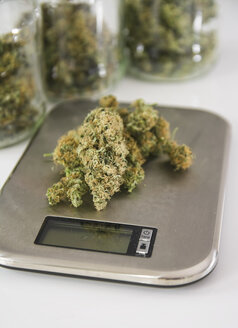 Studio, Marijuana drugs on digital scale, close up stock photo