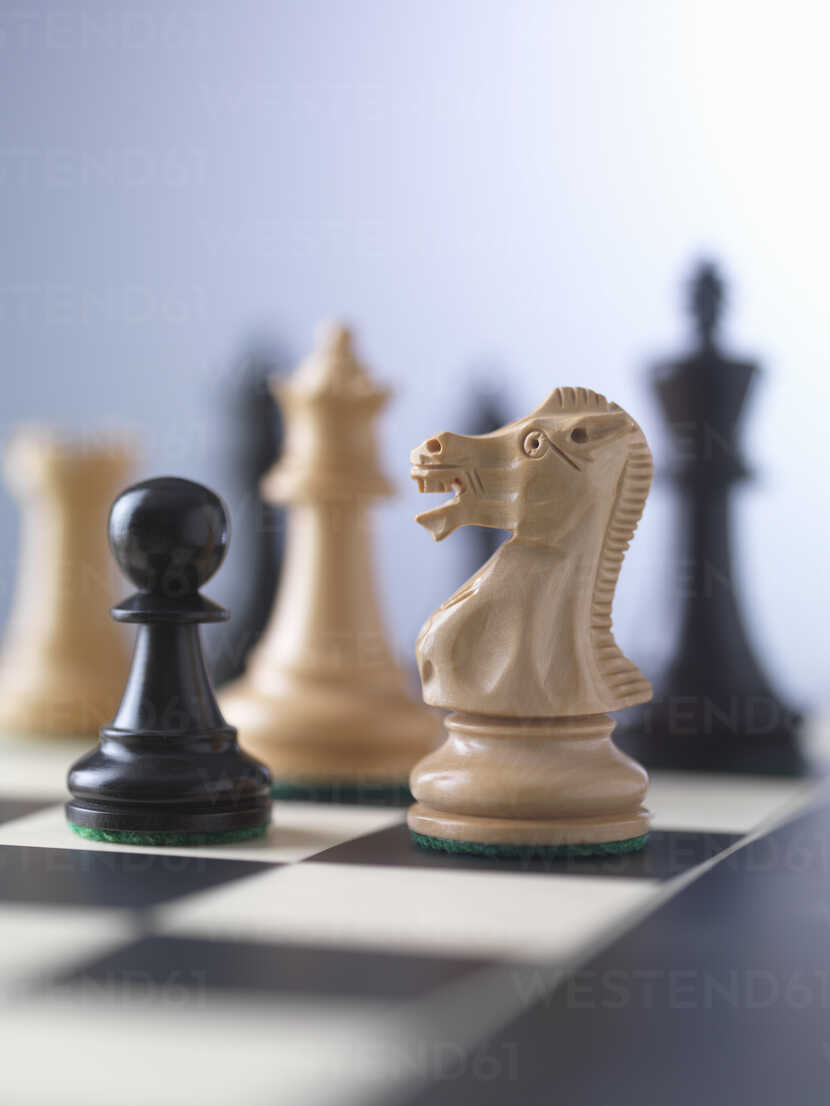 Chess Game with King Checkmate by Queen Stock Photo - Image of