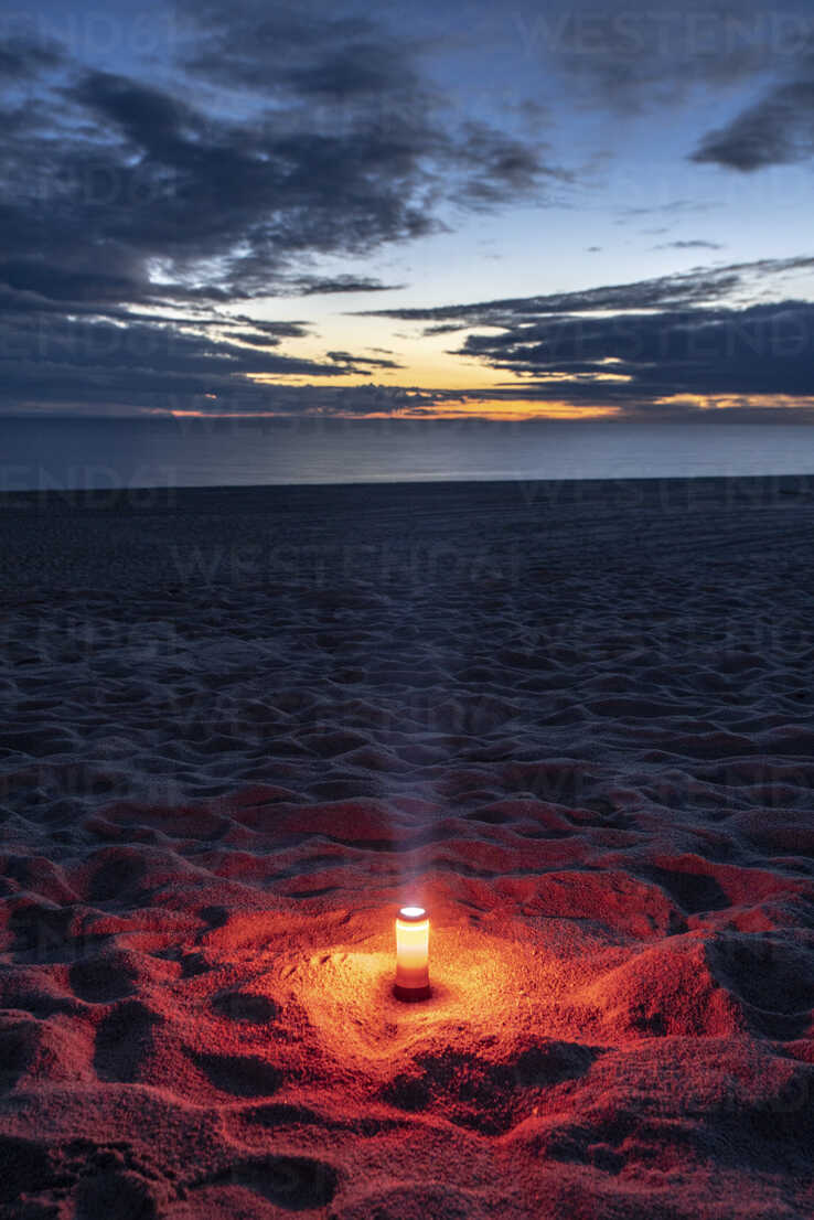 Candle On The Beach Stock Photo, Picture and Royalty Free Image