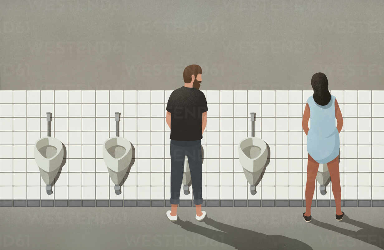 Man and transgender woman using urinals in bathroom stock photo