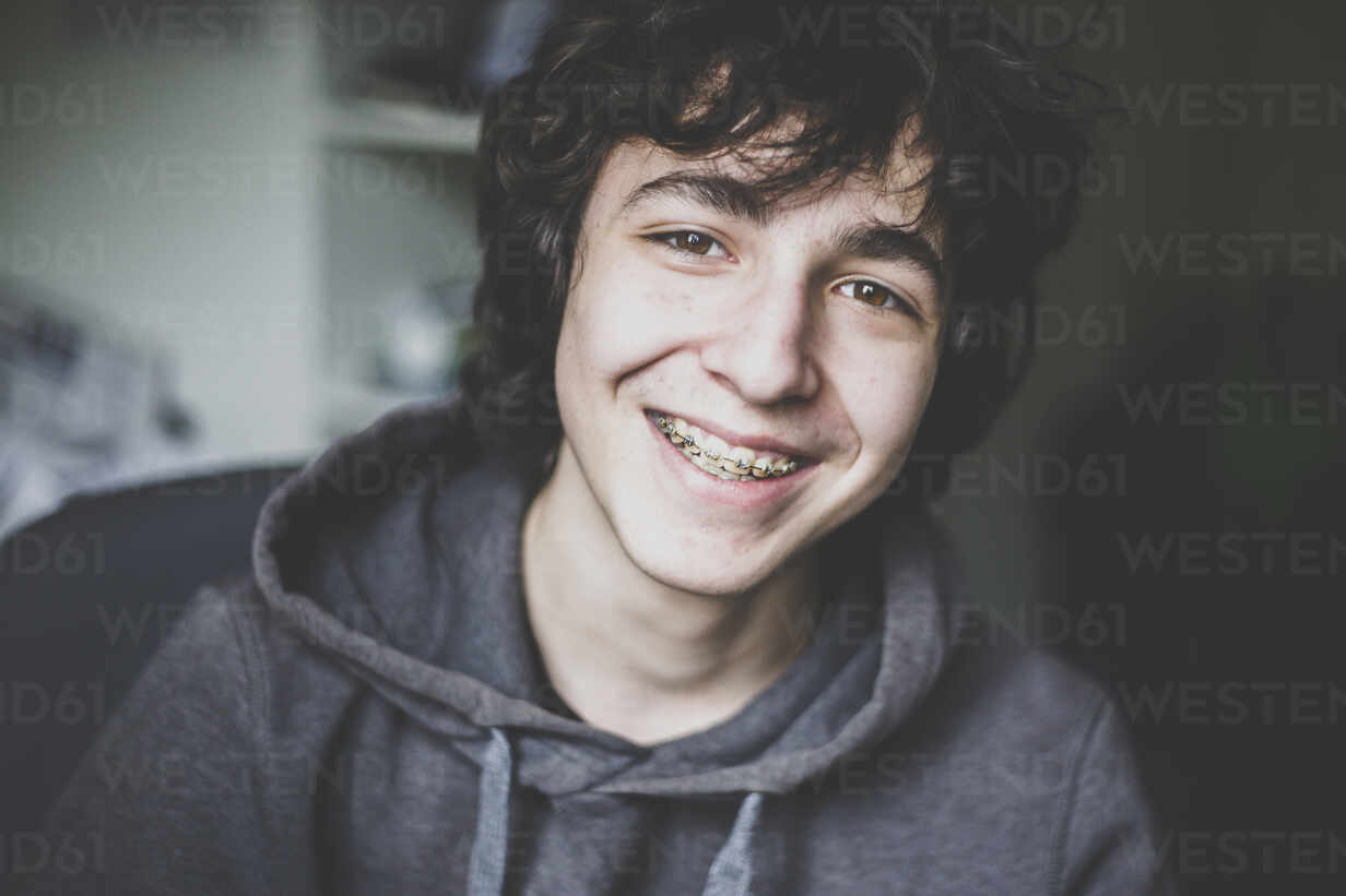 teen guy smiling