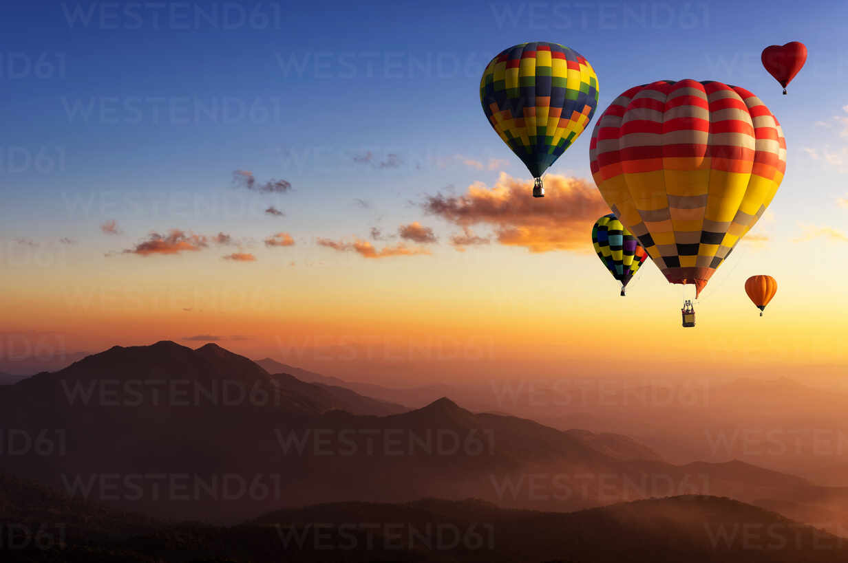 Hot Air Balloons Flying In Sky During Sunset stock photo